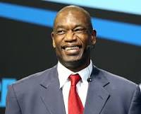 How tall is Dikembe Mutombo?